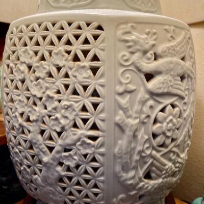 Reticulated Porcelain Blanc de Chine Ginger Jar Lamp (there are two of them, one on either end of the cabinet) The interior light comes...