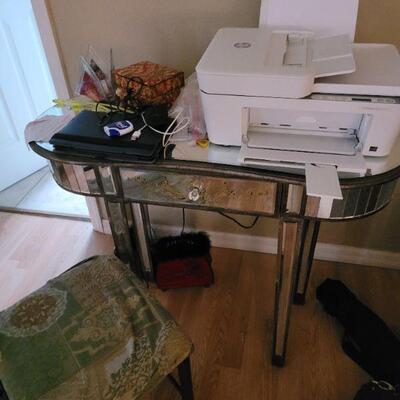 copier and a mirrored makeup table