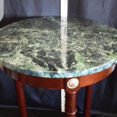 marble top table with wooden legs