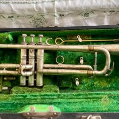 Antique trumpet in case