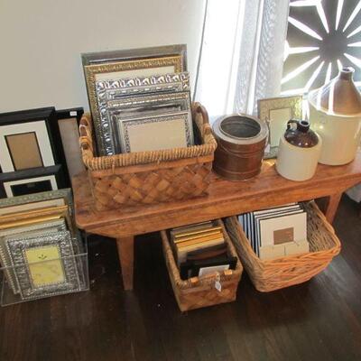 Lots of designer frames - nice quality!  Antique reclaimed barnwood handmade bench, antique stoneware crocks