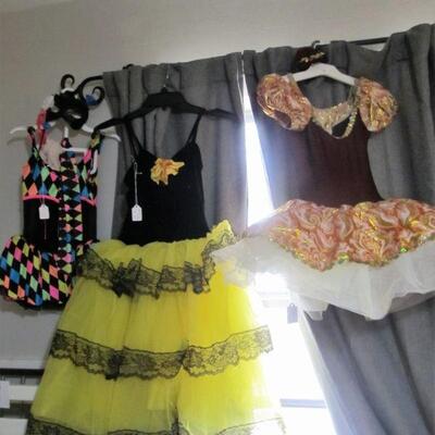 Several quality girls dress up, dance, play, or costume dresses.