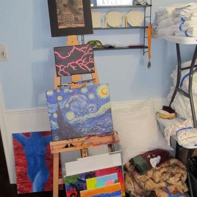 Artist painting easel