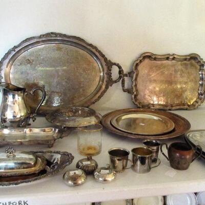 Antique silver-plated serving pieces.