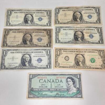 #1552 â€¢ (5) Blue Seal $1 Note, Green Seal $1 Note and Canada $1 Note