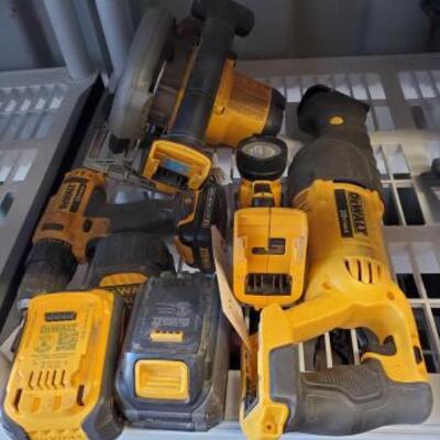 #7036 â€¢ Dewalt Power Tools
Includes Batteries, Reciprocating Saw, Circular Saw, Drill, Tape Measure, And Flashlight

