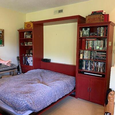 Murphy bed with bookcases, excellent condition and custom made, packs into 3 units
