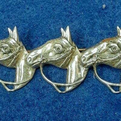 LAN3446A	https://www.ebay.com/itm/115128437219	LAN3446A VINTAGE STERLING  SILVER  HORSES HEAD PIN BROOCH  (4.3  GRAMS)		BIN	 $19.99 
