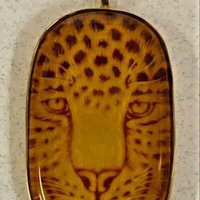 https://www.ebay.com/itm/115120675301	NC571 LEOPARD CHARM AND NECKLACE 10K GOLD CARVED AMBER		 BIN 	 $99.99 
