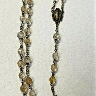https://www.ebay.com/itm/125027792894	NC578 ROSARY STERLING SILVER WITH CLEAR GLASS BEADS		 BIN 	 $19.99 
