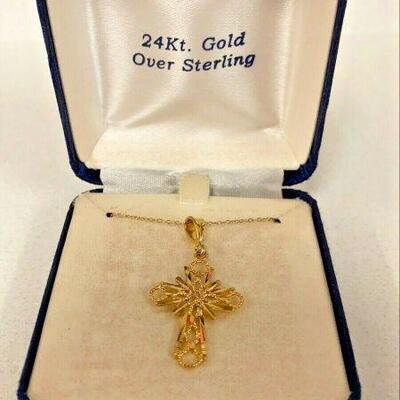 https://www.ebay.com/itm/125027792888	NC570 CROSS NECKLACE 24 KT GOLD PLATED STERLING SILVER ON 20 IN CHAIN 		 BIN 	 $19.99 
