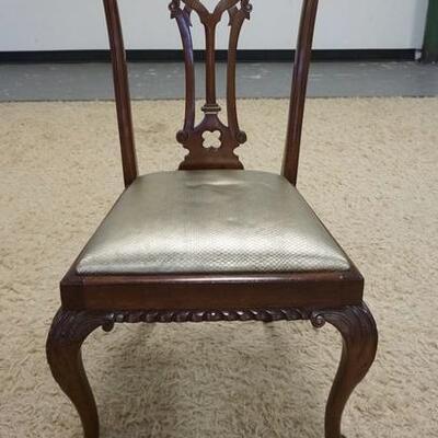 1194	CARVED CHIPPENDALE STYLE CHAIR,  BALL & CLAW FEET. 40 3/4 IN H
1194	CARVED CHIPPENDALE STYLE CHAIR,  BALL & CLAW FEET. 40...