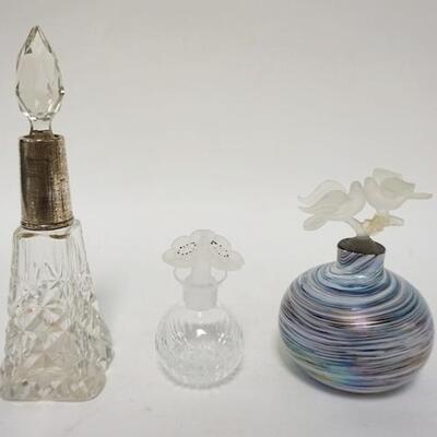 1133	3 PERFUME BOTTLES, ONE IS CUT W/AN ENGLISH STERLING SILVER COLLAR, CHIP ON THE STOPPER, 7 1/2 IN HIGH, ONE ART GLASS W/REPAIRED BIRD...