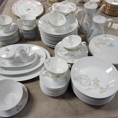1269	94 PIECE ROSENTHAL WHITE ROSE DINNERWARE SET, LARGEST PLATTER IS 15 1/2 IN, COFFEE POT IS 9 1/2 IN HIGH
