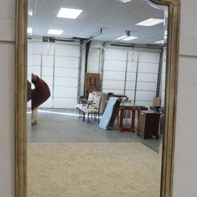 1196	WELLINGTON HALL MIRROR HAS BASKET & LEAF CARVING AT THE CREST. BEVELED 28 IN X 47 IN
