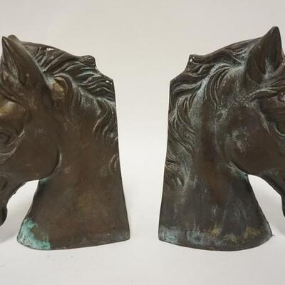 1106	PAIR OF METAL OVER PLASTER HORSE HEADS BOOKENDS, 8 IN HIGH

