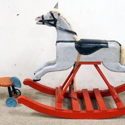 1297	2 PIECE WOODEN ROCKING HORSE & RIDE ON HORSE W/BELLS IN THE WHEELS, MARKED MADE IN USA, ROCKING HORSE IS 42 IN LONG X 31 IN HIGH
