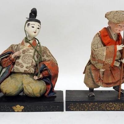 1291	PAIR OF ASIAN DOLLS ON DECORATED WOODEN BASES, 11 1/2 IN HIGH
