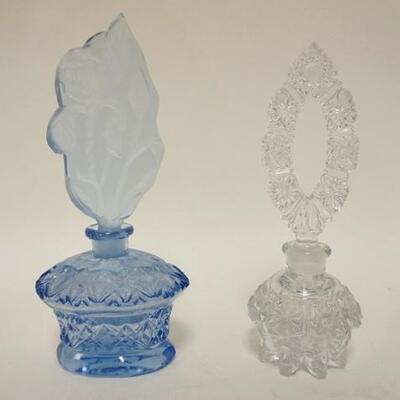 1132	2 PERFUME BOTTLES, BLUE BOTTLE IS MARKED MADE IN CZECHSLOVAKIA & HAS THE DABBER STILL ATTACHED & A NICK ON THE STOPPER TOP,...
