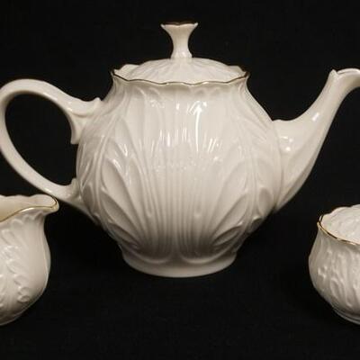 1259	LENOX 3 PIECE TEASET MADE IN USA, POT IS 7 1/2 IN H 
