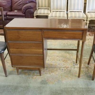 1232	MID CENTURY MODERN DESK & 2 CHAIRS HAS TEARS IN THE VINYL SEATS. DESK HAS A FORMICA TOP. 42 1/4 IN W 31 1/2 IN H & 18 IN DEEP

