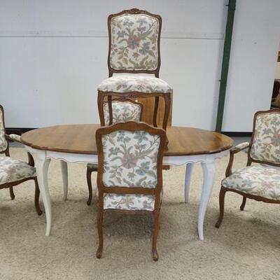 1219	ETHAN ALLEN TABLE W/ 5 CHAIRS *COUNTRY GRAND* TABLE HAS 2-18 IN SKIRTED LEAVES, 70 1/2 IN X 42 IN CLOSED.  2 ARM & 3 SIDE, CHAIRS...