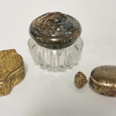 1134	3 SMALL DRESSER BOXES, 2 ARE SILVER, ORNATE BOX IS MARKED #900, WRAPPED CANDY SHAED BOX MARKED 925, 2 SILVER BOXES WEIGHT 1.37 TOZ
