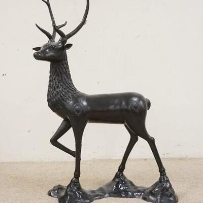 1034	BRONZE FLOOR STANDING STAG, PAINTED BLACK, 49 IN HIGH X APPROXIMATELY 32 IN LONG

