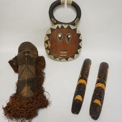 1110	GROUP OF 4 ETHNIC WOOD CARVINGS. LARGEST MASK IS 21 IN HIGH
