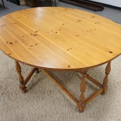 1188	LANE PINE DROP LEAF TABLE, MUSEUM OF AMERICAN FOLK ART AMERICA COLLECTION. 68 IN X 23 1/2 IN CLOSED. DROPS ARE 16 1/2 IN. 29 1/2 IN H 
