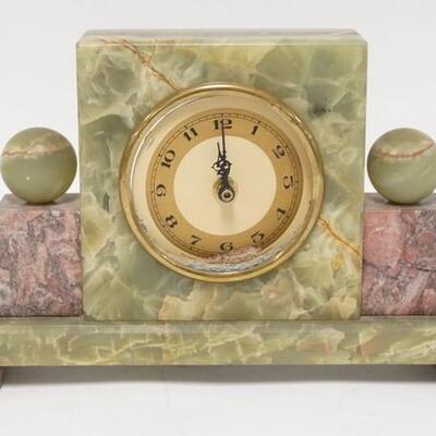 1263	ART DECO MARBLE & ONYX CLOCK CASE, WORKS REPLACED W/BATTERY, FRONT GLASS MISSING, 14 IN WIDE X 7 1/8 IN HIGH
