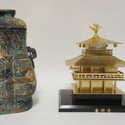1097	2 PIECE ASIAN METAL IRON COVERED URN & A PAGODA STRUCTURE, TALLEST IS 9 1/2 IN
