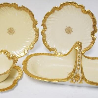 1299	4 PIECE T&V LIMOGES FOR BAYNARD, BANKS & BRYAN, WILMINGTON DELAWARE, BASKET IS 13 1/2 IN WIDE, MAYONNAISE DISH HAS A RIM CHIP
