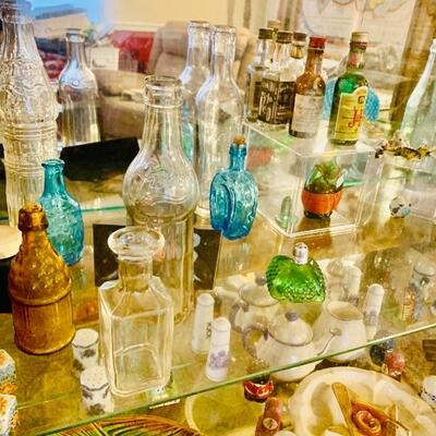 LOTS OF NICE GLASS, BLUE, GREEN, LIQUOR DECANTERS, BOTTLES, MUCH MORE THAN IN THE PICTURES