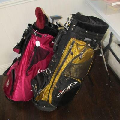 2 NAME-BRAND GOLF BAGS, ONE BEING A TEXAS A & M BAG.