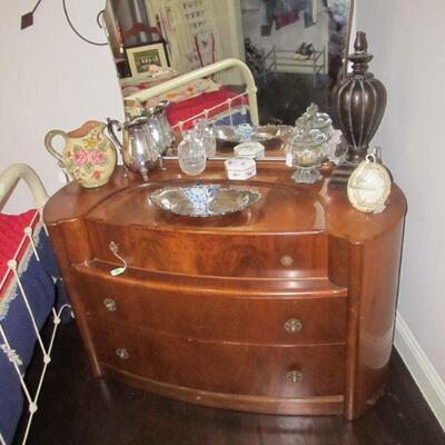 Antique Victorian cast-iron metal full-size bed w/ antique quilt & quilt tops. 2 antique Art deco dressers.