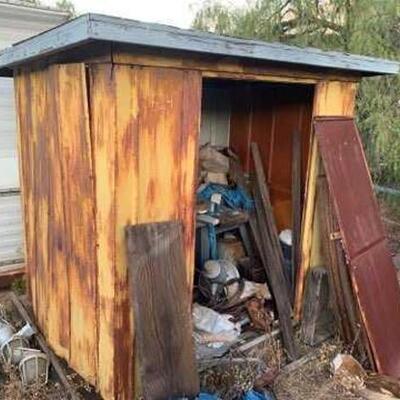 #524 • Shed with Contents Included.Measures approx 6.3 feet tall. All contents included. 