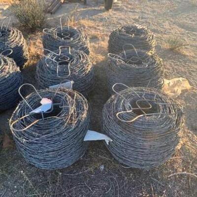 #408 • 12 Rolls Of Barbed Wire: 11 New Rolls 1 Partially Used. 12.5 Gauge 4Pt- 5” Spacing, 