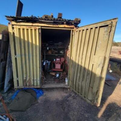 #516 â€¢ 8' Storage Container.Measures Approx: 86" x 74" x 77" Container Only Contents In, On, And Around Not Included