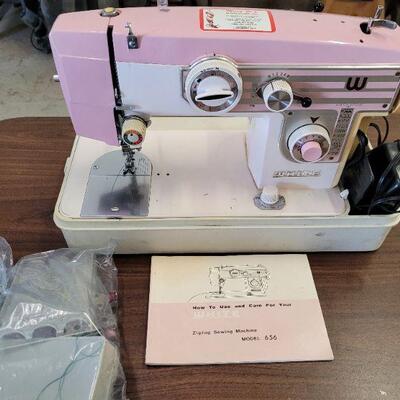 White sewing machine, all original paperwork, it works
