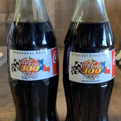 (2) Coca Cola Texas Motor Speedway Bottles:
Inaugural Race (97) and (98) Texas Motor Speedway