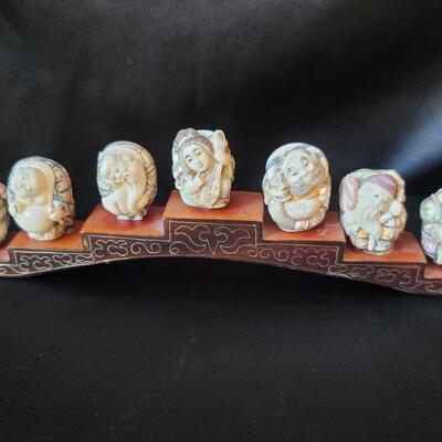 (7) Carved Ivory Japanese Figures on Wooden Stand