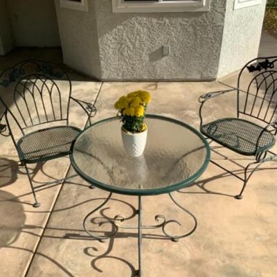 Small patio table w/2 chairs.   $75