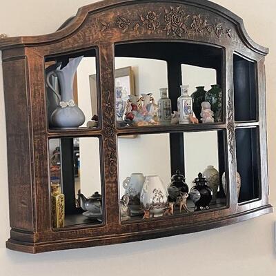 curio cabinet and collectibles