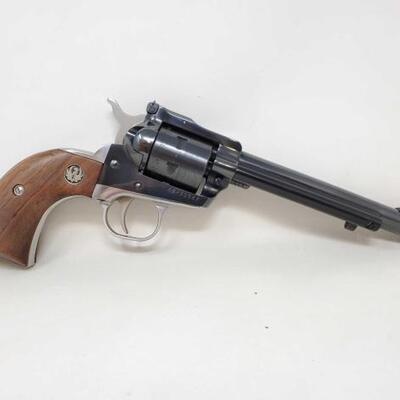 #302 â€¢ Ruger New Model Single Six .22Cal Revolver And Case
Serial Number: 76-11527 Barrel Length: 6.5