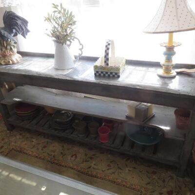 Old potting bench with distressed metal top
