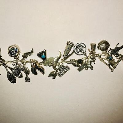 All Sterling vintage 
 27 charms ~ bracelet