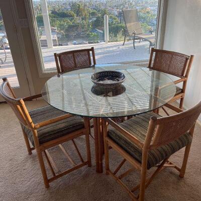 
RATTAN AND GLASS DINING SET