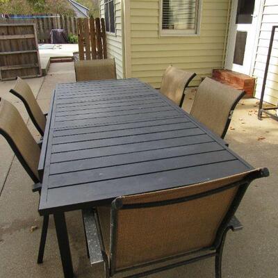 Patio table with 6 chairs- comes with cover