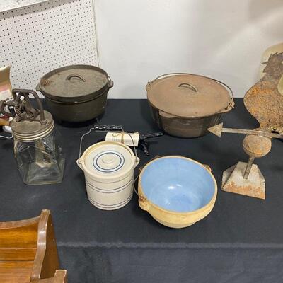 Stoneware Bowl, Butter Jar, Two Cast Iron Dutch Ovens, Whipper Jar